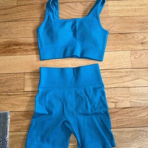 NWT teal sports bra and shorts